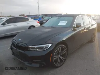 2021 BMW 3 Series 330i with VIN 3MW5R1J02M8B95303, listed as a IAAI auction lot 42184843 with 55,928 mi miles and . Bid and sale history available at carsss.com. Image 18.