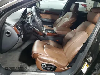 2011 Audi A8 z VIN WAURVAFD8BN005569, wystawiony jako Copart lot #52101065 z przebiegiem 104 893 mil mil oraz Szkody całkowita. Historia ofert i sprzedaży dostępna na DreamBid. Obrazek 7.