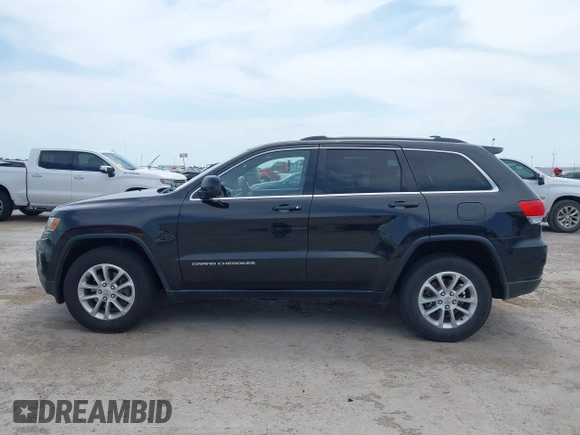 2014 Jeep Grand Cherokee Laredo with VIN 1C4RJFAG8EC440119, listed as a IAAI auction lot 42030855 with 179,392 mi miles and . Bid and sale history available at DreamBid. Image 14.
