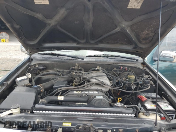 1997 Toyota T100 SR5 z VIN JT4UN24D4V0037751, wystawiony jako Copart lot #58940575 z przebiegiem 225 109 mil mil oraz Czysty tytuł • Clean title. Historia ofert i sprzedaży dostępna na DreamBid. Obrazek 11.
