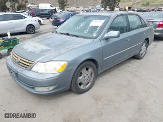 2003 Toyota Avalon XL with VIN 4T1BF28B83U318529, listed as a IAAI auction lot 42058121 with 171,889 mi miles. Bid and sale history available at carsss.com. Image 2.