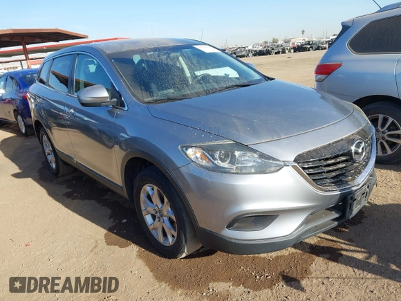 2015 Mazda CX-9 Touring with VIN JM3TB3CA7F0451472, listed as a IAAI auction lot 41559364 with 126,797 mi miles. Bid and sale history available at carsss.com. Image 1.