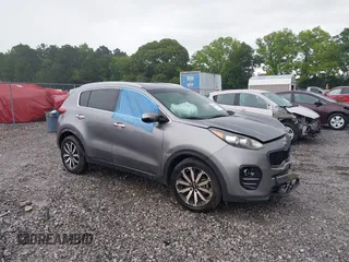 2018 Kia Sportage EX z VIN KNDPN3AC0J7310720, wystawiony jako IAAI lot #42400165 z przebiegiem 118 929 mil mil oraz . Historia ofert i sprzedaży dostępna na DreamBid. Obrazek 1.