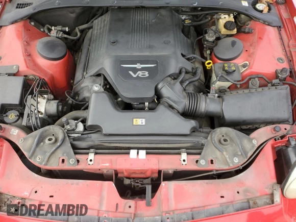 2005 Ford Thunderbird Deluxe z VIN 1FAHP60A05Y102875, wystawiony jako Copart lot #81070624 z przebiegiem 84 260 mil mil oraz Szkoda całkowita • Salvage title. Historia ofert i sprzedaży dostępna na DreamBid. Obrazek 11.