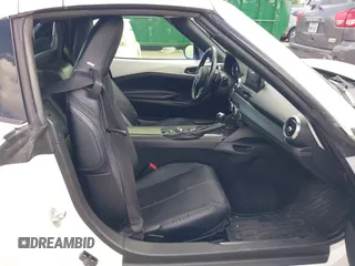 2020 Mazda MX-5 Miata Grand Touring z VIN JM1NDAM79L0411456, wystawiony jako IAAI lot #42229479 z przebiegiem 63 508 mil mil oraz . Historia ofert i sprzedaży dostępna na DreamBid. Obrazek 5.
