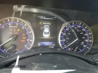 2015 Infiniti Q50 Premium with VIN JN1BV7AP4FM345938, listed as a Copart auction lot 77319234 with 134,731 mi miles and Salvage Title. Bid and sale history available at carsss.com. Image 9.