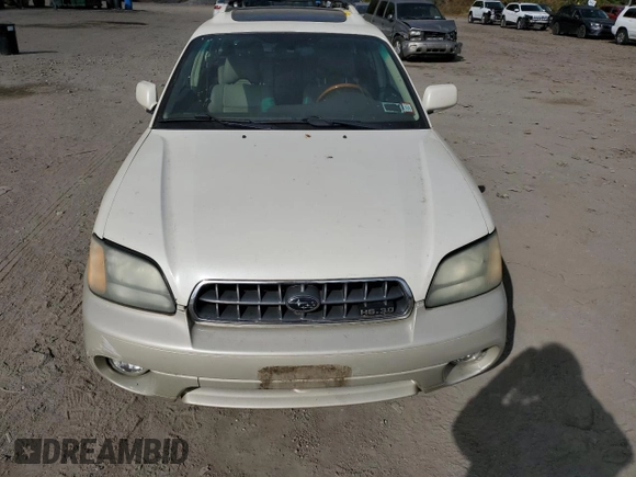 2004 Subaru Legacy Outback VDC with VIN 4S3BH896547638183, listed as a Copart auction lot 74036294 with 205,887 mi miles and Clean title. Bid and sale history available at DreamBid. Image 5.