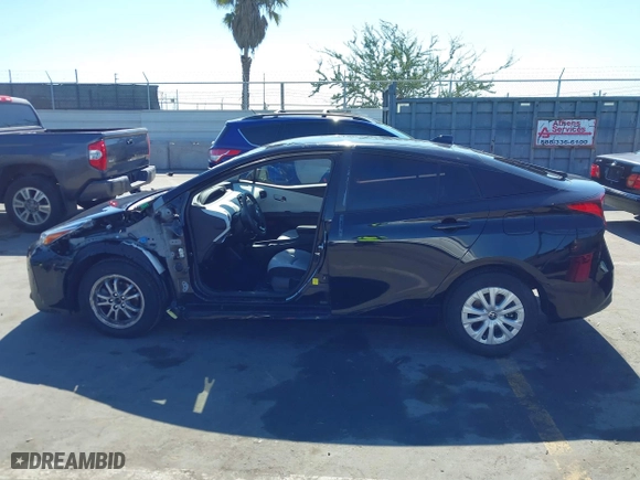2022 Toyota Prius L Eco with VIN JTDKAMFU3N3165036, listed as a IAAI auction lot 41657575 with 44,099 mi miles. Bid and sale history available at carsss.com. Image 15.