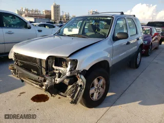 2005 Ford Escape XLS Value with VIN 1FMYU02Z75KB13387, listed as a Copart auction lot 40399594 with 148,579 mi miles and Salvage Title. Bid and sale history available at carsss.com. Image 2.