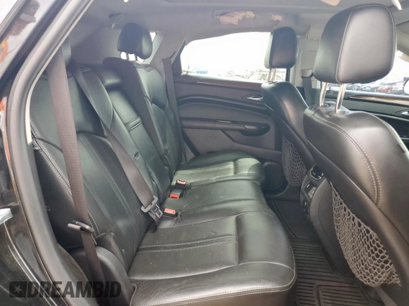 2013 Cadillac SRX Premium Collection с VIN 3GYFNJE39DS650569, выставлен на аукционе Copart как лот 59947905 с пробегом 146 548 миль миль и Списание • Salvage title. История ставок и продаж доступна на DreamBid. Изображение 11.