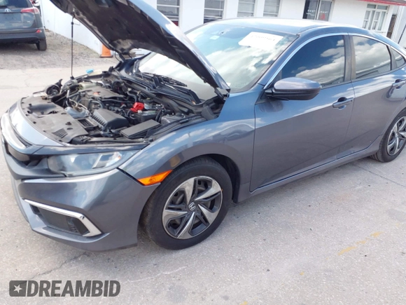 2020 Honda Civic LX with VIN 2HGFC2F65LH575320, listed as a IAAI auction lot 42009564 with Not Provided miles and . Bid and sale history available at DreamBid. Image 17.