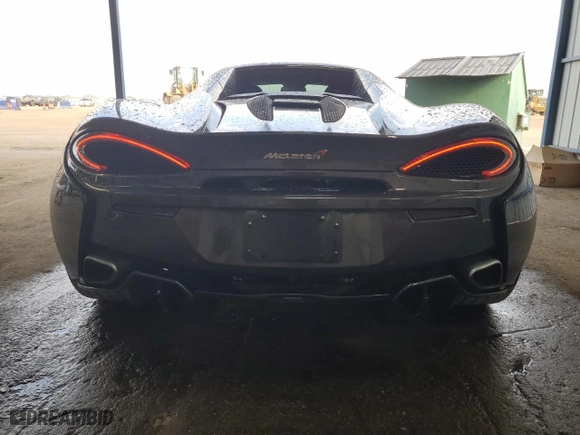 2018 McLaren 570S with VIN SBM13FAA1JW004280, listed as a Copart auction lot 63609654 with 22,596 mi miles and Salvage Title. Bid and sale history available at carsss.com. Image 6.