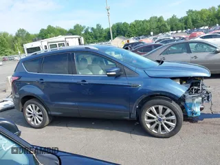2018 Ford Escape Titanium with VIN 1FMCU9J92JUB01162, listed as a IAAI auction lot 42495112 with 96,280 mi miles and . Bid and sale history available at DreamBid. Image 14.