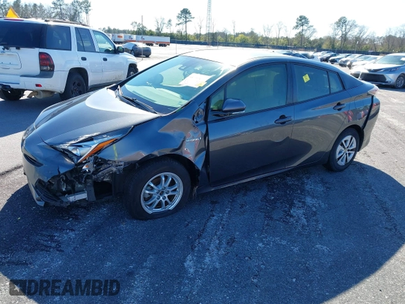 2017 Toyota Prius Two z VIN JTDKARFU4H3042976, wystawiony jako IAAI lot #41740418 z przebiegiem 66 734 mil mil oraz . Historia ofert i sprzedaży dostępna na DreamBid. Obrazek 2.