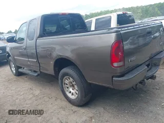2002 Ford F-150 XL with VIN 2FTRX18W22CA23065, listed as a IAAI auction lot 42128001 with 262,452 mi miles and . Bid and sale history available at DreamBid. Image 3.