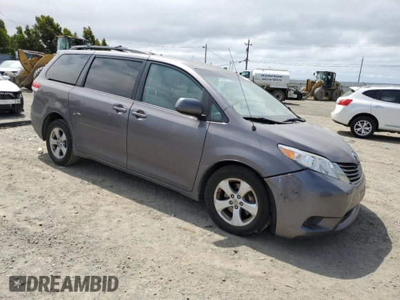 2014 Toyota Sienna LE AAS with VIN 5TDKK3DC6ES491574, listed as a Copart auction lot 59815785 with 189,975 mi miles and Salvage title. Bid and sale history available at DreamBid. Image 4.