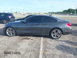 2014 BMW 4 Series 428i xDrive with VIN WBA3N5C57EK196790, listed as a IAAI auction lot 40571670 with 108,114 mi miles and . Bid and sale history available at DreamBid. Image 14.