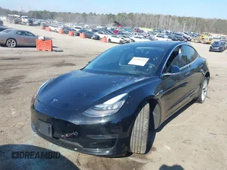 2020 Tesla Model 3 Standard Range Plus with VIN 5YJ3E1EA0LF660759, listed as a IAAI auction lot 41505250 with 63,322 mi miles and . Bid and sale history available at DreamBid. Image 17.