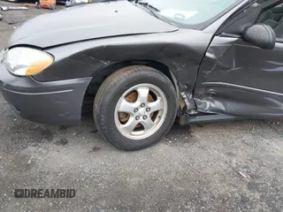 2004 Ford Taurus SE with VIN 1FAFP53254A204492, listed as a IAAI auction lot 41543153 with 70,395 mi miles and . Bid and sale history available at DreamBid. Image 6.