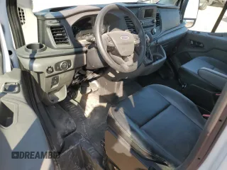 2024 Ford Transit Cargo with VIN 1FTBR1C8XRKA85811, listed as a Copart auction lot 74528914 with 1,725 mi miles and Salvage Title. Bid and sale history available at DreamBid. Image 8.