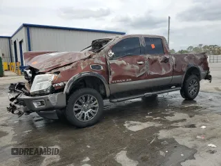 2016 Nissan Titan Platinum Reserve z VIN 1N6BA1F28GN506397, wystawiony jako Copart lot #53831235 z przebiegiem 258 474 mil mil oraz Nie do naprawy. Historia ofert i sprzedaży dostępna na DreamBid. Obrazek 1.