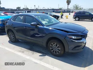 2021 Mazda CX-30 S with VIN 3MVDMAAL1MM270540, listed as a IAAI auction lot 42521513 with 63,993 mi miles and . Bid and sale history available at DreamBid. Image 1.