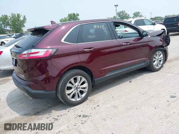 2019 Ford Edge Titanium with VIN 2FMPK4K96KBB20247, listed as a IAAI auction lot 42450212 with 121,756 mi miles and . Bid and sale history available at DreamBid. Image 4.