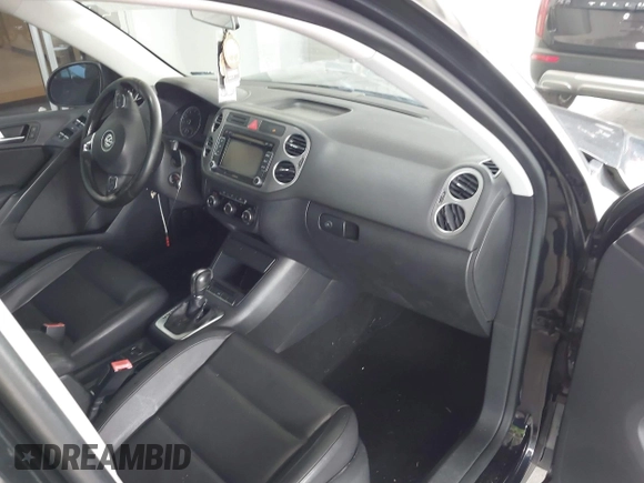 2011 Volkswagen Tiguan SE with VIN WVGAV7AX1BW549681, listed as a IAAI auction lot 40772939 with 157,547 mi miles and . Bid and sale history available at DreamBid. Image 5.
