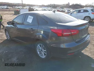 2018 Ford Focus SE z VIN 1FADP3F2XJL295508, wystawiony jako IAAI lot #41608216 z przebiegiem 89 696 mil mil oraz . Historia ofert i sprzedaży dostępna na DreamBid. Obrazek 3.