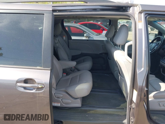 2015 Toyota Sienna XLE with VIN 5TDYK3DC9FS685768, listed as a IAAI auction lot 42062942 with 132,242 mi miles. Bid and sale history available at carsss.com. Image 8.