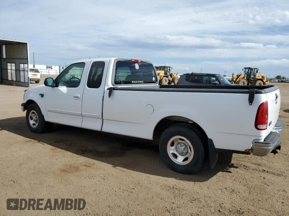 1999 Ford F-150 with VIN 2FTRX17L0XCA37979, listed as a Copart auction lot 58216695 with 256,055 mi miles and Clean title. Bid and sale history available at DreamBid. Image 2.