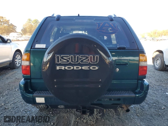 1999 Isuzu Rodeo S с VIN 4S2CK58W6X4352441, выставлен на аукционе Copart как лот 81915384 с пробегом 338 513 миль миль и На запчасти • Non repairable. История ставок и продаж доступна на DreamBid. Изображение 6.