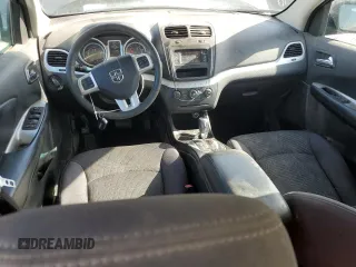 2013 Dodge Journey American Value with VIN 3C4PDCAB8DT590509, listed as a Copart auction lot 57347375 with 203,642 mi miles and Clean title. Bid and sale history available at DreamBid. Image 8.