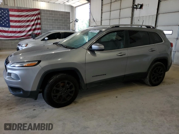 2016 Jeep Cherokee Latitude with VIN 1C4PJMCSXGW180482, listed as a Copart auction lot 60639315 with 118,164 mi miles and Salvage title. Bid and sale history available at DreamBid. Image 1.