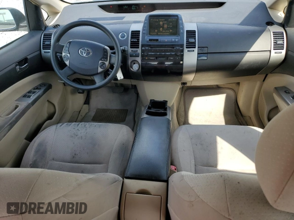 2005 Toyota Prius z VIN JTDKB20U250122898, wystawiony jako Copart lot #53784885 z przebiegiem 211 885 mil mil oraz Szkoda całkowita • Salvage title. Historia ofert i sprzedaży dostępna na DreamBid. Obrazek 8.