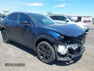 2024 Mazda CX-30 S Select Sport with VIN 3MVDMBBM2RM657781, listed as a IAAI auction lot 42297311 with 13,677 mi miles and . Bid and sale history available at DreamBid. Image 1.