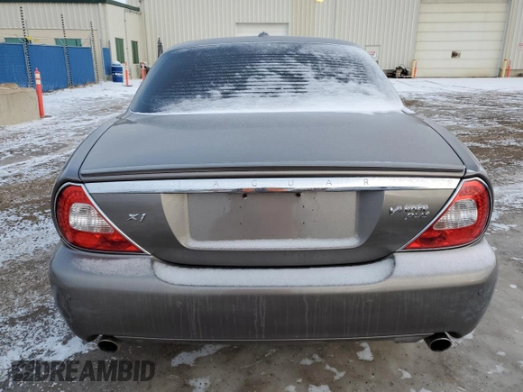 2009 Jaguar XJ with VIN SAJXA82B69SH31532, listed as a Copart auction lot 88027035 with 90,233 mi miles and Clean Title. Bid and sale history available at DreamBid. Image 6.