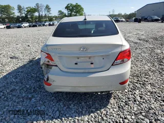 2017 Hyundai Accent SE with VIN KMHCT4AE5HU250839, listed as a Copart auction lot 52070145 with 104,090 mi miles and Salvage Title. Bid and sale history available at carsss.com. Image 6.