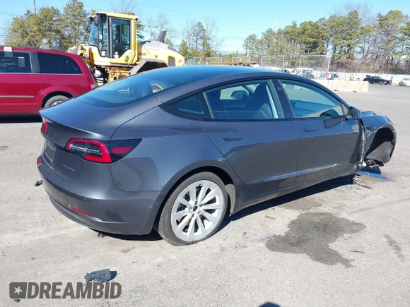 2022 Tesla Model 3 Long Range with VIN 5YJ3E1EB3NF290550, listed as a IAAI auction lot 41826287 with 67,648 mi miles and . Bid and sale history available at DreamBid. Image 4.
