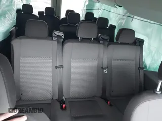 2021 Ford Transit Passenger XL with VIN 1FBAX2C87MKA13243, listed as a IAAI auction lot 41211001 with 94,954 mi miles and . Bid and sale history available at DreamBid. Image 8.