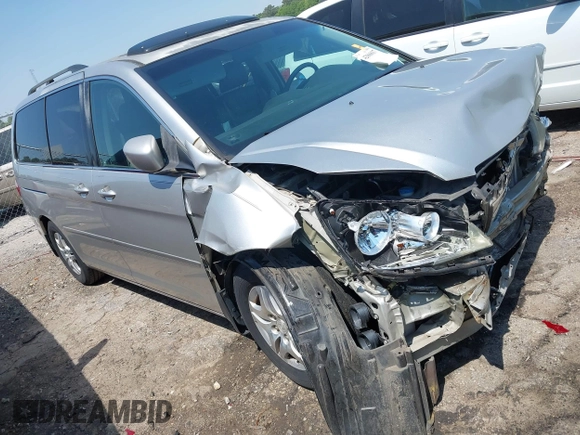 2007 Honda Odyssey EX-L z VIN 5FNRL38667B453060, wystawiony jako IAAI lot #42066637 z przebiegiem 184 439 mil mil oraz . Historia ofert i sprzedaży dostępna na DreamBid. Obrazek 1.