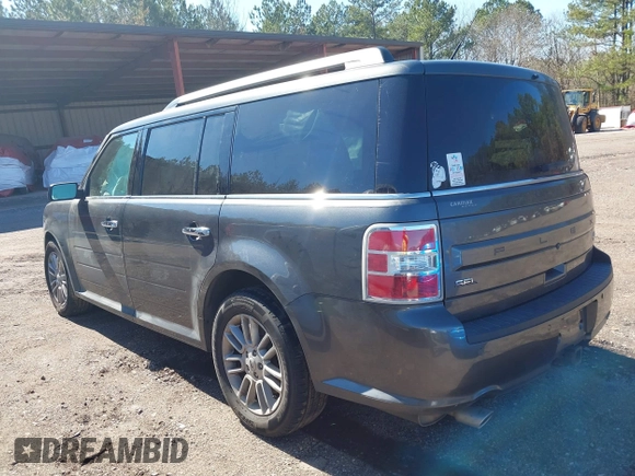 2018 Ford Flex SEL z VIN 2FMGK5C8XJBA17780, wystawiony jako IAAI lot #41600772 z przebiegiem 162 962 mil mil oraz . Historia ofert i sprzedaży dostępna na DreamBid. Obrazek 3.