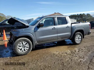 2023 Nissan Frontier Pro-X with VIN 1N6ED1EJ2PN606489, listed as a Copart auction lot 89196555 with 12,979 mi miles and Salvage title. Bid and sale history available at DreamBid. Image 1.