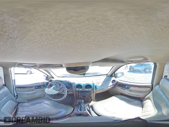 2004 GMC Envoy SLT с VIN 1GKDS13S942270065, выставлен на аукционе Copart как лот 52803515 с пробегом 242 026 миль миль и Списание • Salvage title. История ставок и продаж доступна на DreamBid. Изображение 13.