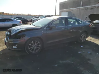 2020 Ford Fusion Plug-In Hybrid Titanium with VIN 3FA6P0SU5LR230939, listed as a Copart auction lot 77899134 with 104,656 mi miles and Salvage Title. Bid and sale history available at carsss.com. Image 1.
