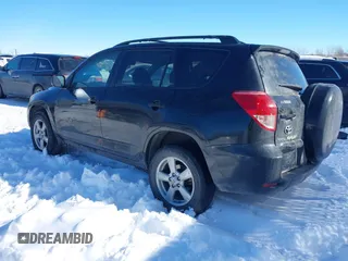 2006 Toyota RAV4 with VIN JTMZD33V065016103, listed as a IAAI auction lot 41619545 with 198,590 mi miles. Bid and sale history available at carsss.com. Image 3.