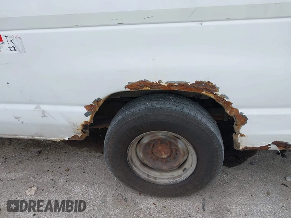 2008 Ford Econoline Cargo Commercial with VIN 1FTSE34L38DA85713, listed as a IAAI auction lot 41789119 with 182,002 mi miles and . Bid and sale history available at DreamBid. Image 16.
