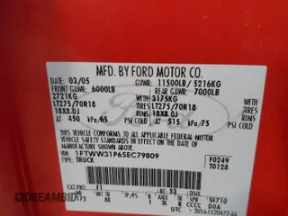 2005 Ford F-350 XL with VIN 1FTWW31P65EC79809, listed as a Copart auction lot 49601805 with 192,539 mi miles and Salvage Title. Bid and sale history available at DreamBid. Image 14.