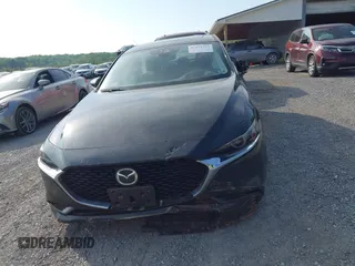 2021 Mazda 3 Premium z VIN 3MZBPADL2MM254467, wystawiony jako IAAI lot #42151557 z przebiegiem 63 282 mil mil oraz . Historia ofert i sprzedaży dostępna na DreamBid. Obrazek 13.