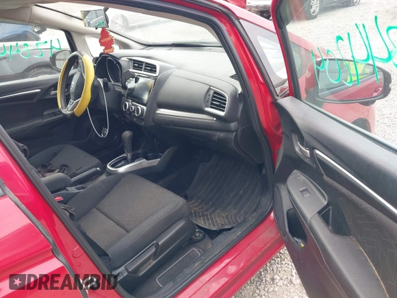 2015 Honda Fit EX-L z VIN 3HGGK5H85FM748931, wystawiony jako IAAI lot #42844204 z przebiegiem 106 381 mil mil oraz . Historia ofert i sprzedaży dostępna na DreamBid. Obrazek 5.